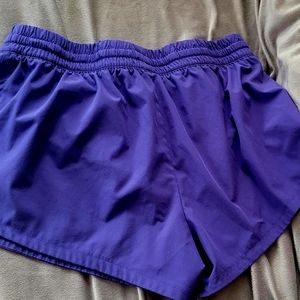 DSG blue shorts with underlining